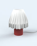 The Volute - Ardent table lamp by Mouchoir, featuring a digital craft design mimicking frozen silk fabric.