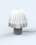 The Volute - Graphite table lamp by Mouchoir, featuring a digital craft design mimicking frozen silk fabric.