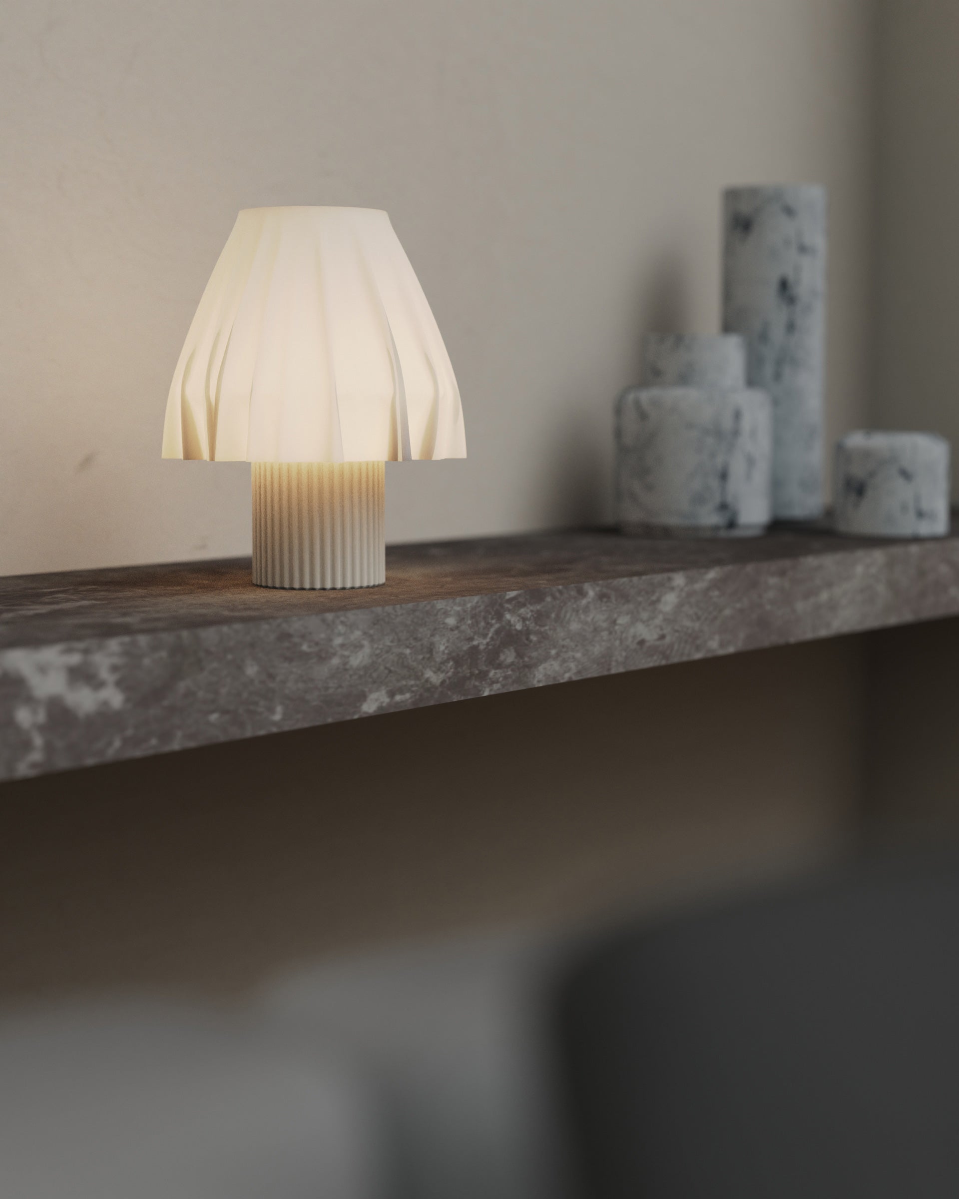 The Volute - Ivory table lamp by Mouchoir, featuring a digital craft design mimicking frozen silk fabric on a marble surface.