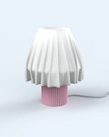 The Volute - Petal table lamp by Mouchoir, featuring a digital craft design mimicking frozen silk fabric.